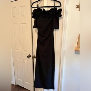 Stunning off the shoulder black formal fitted dress. Size 4